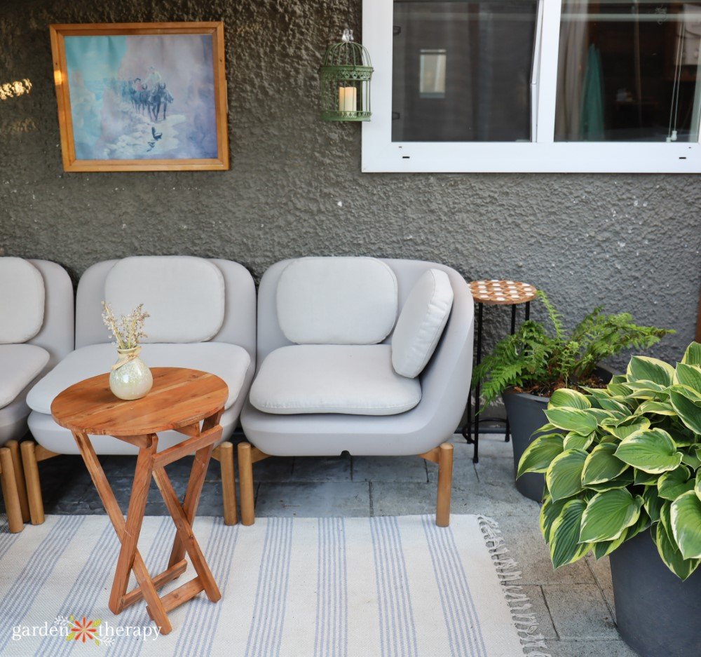 outdoor patio with sectional and artwork
