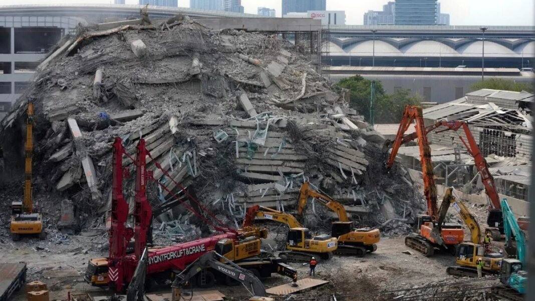 Thai prosecutors issue dozens of charges related to fatal building collapse  