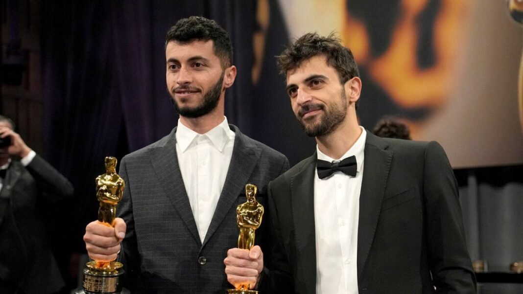 Oscar-winning Palestinian director Basel Adra says Israeli soldiers have raided his home on the West Bank  