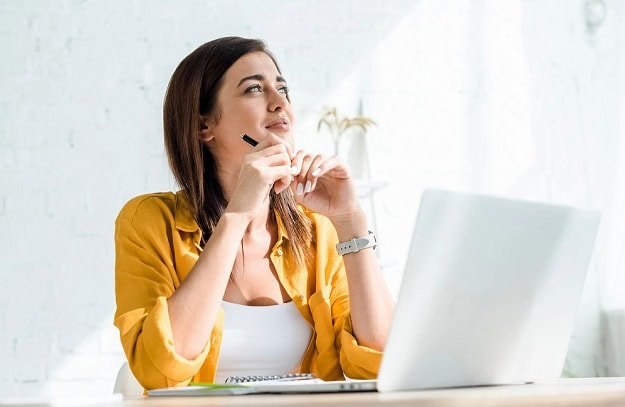 short_tuesday_quotes.jpg A thoughtful woman at work.