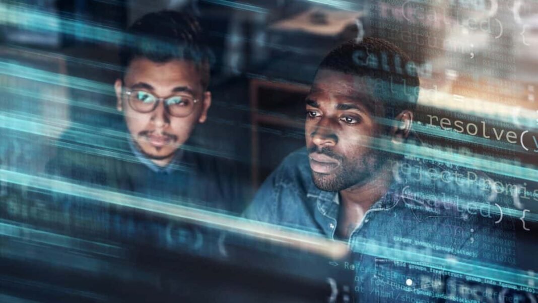ChatGPT and Gemini warn AI is 7/10 threat to this Concept of two young professional men looking at a screen in a technological data centre