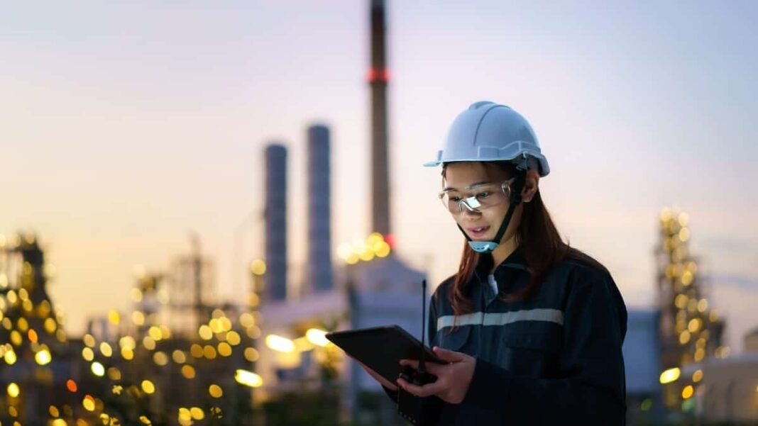Centrica stock price drops 9%! What on earth is going Petrochemical engineer working at night with digital tablet inside oil and gas refinery plant