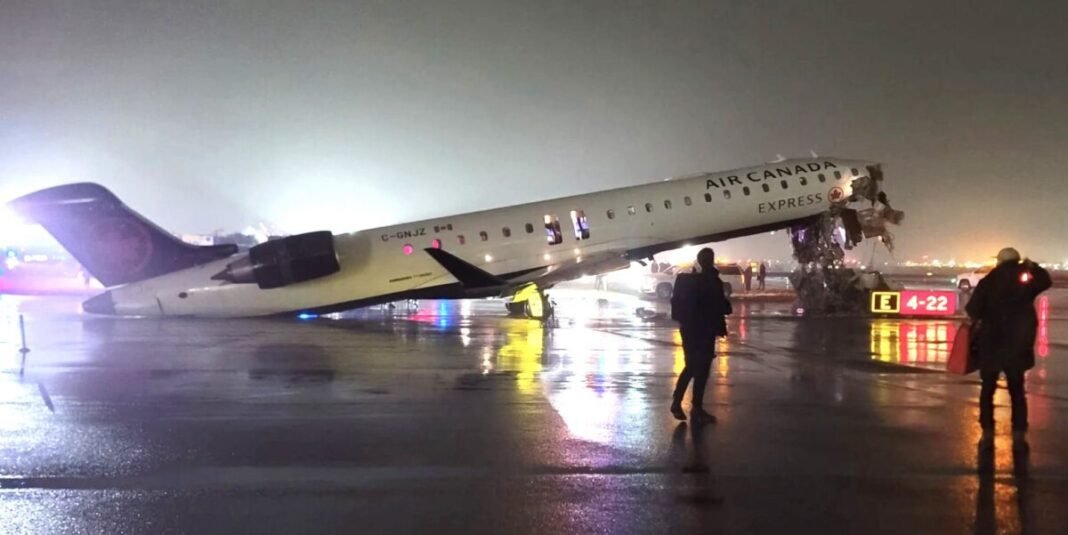 Four firefighters seriously injured after Air Canada plane collides with fire truck at LaGuardia Airport  
