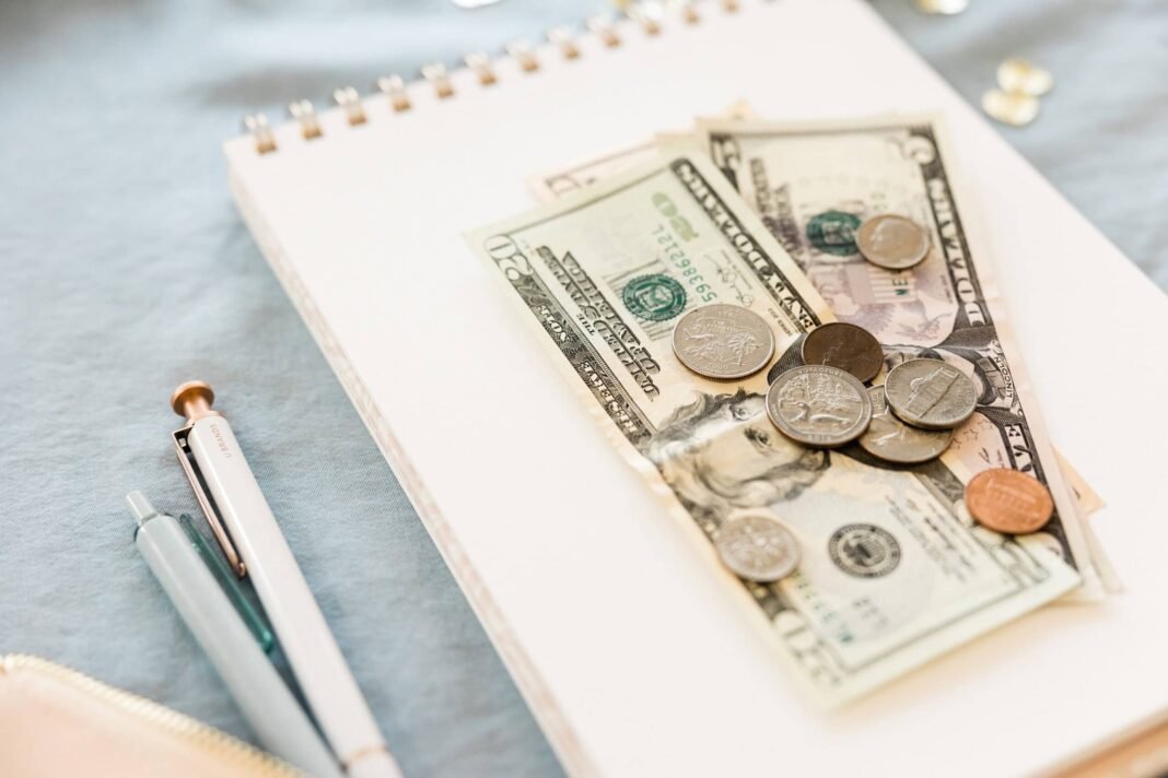 notebook-money-pens-scaled.jpg Is this the best accounting software for small business owners?