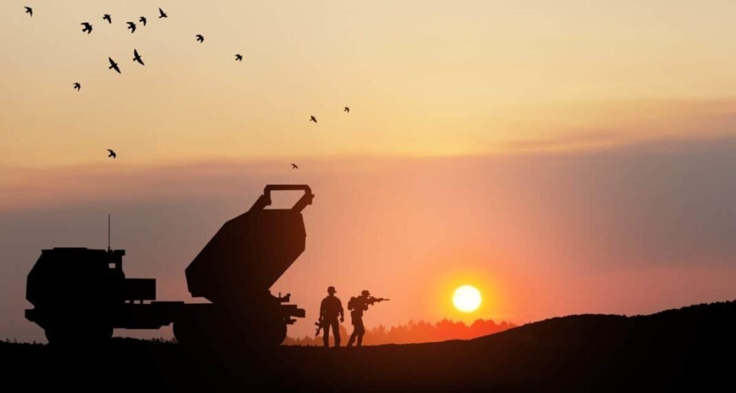 BAE Systems' share price has increased by 274% in 46 Artillery rocket system aimed to the sky and soldiers at sunset.