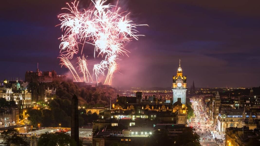 Baillie Gifford, who made her fortune from Tesla and SpaceX, Edinburgh Cityscape with fireworks over The Castle and Balmoral Clock Tower