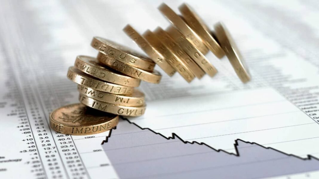 Is the great BP stock price party about to collapse? Stack of British pound coins falling on list of share prices